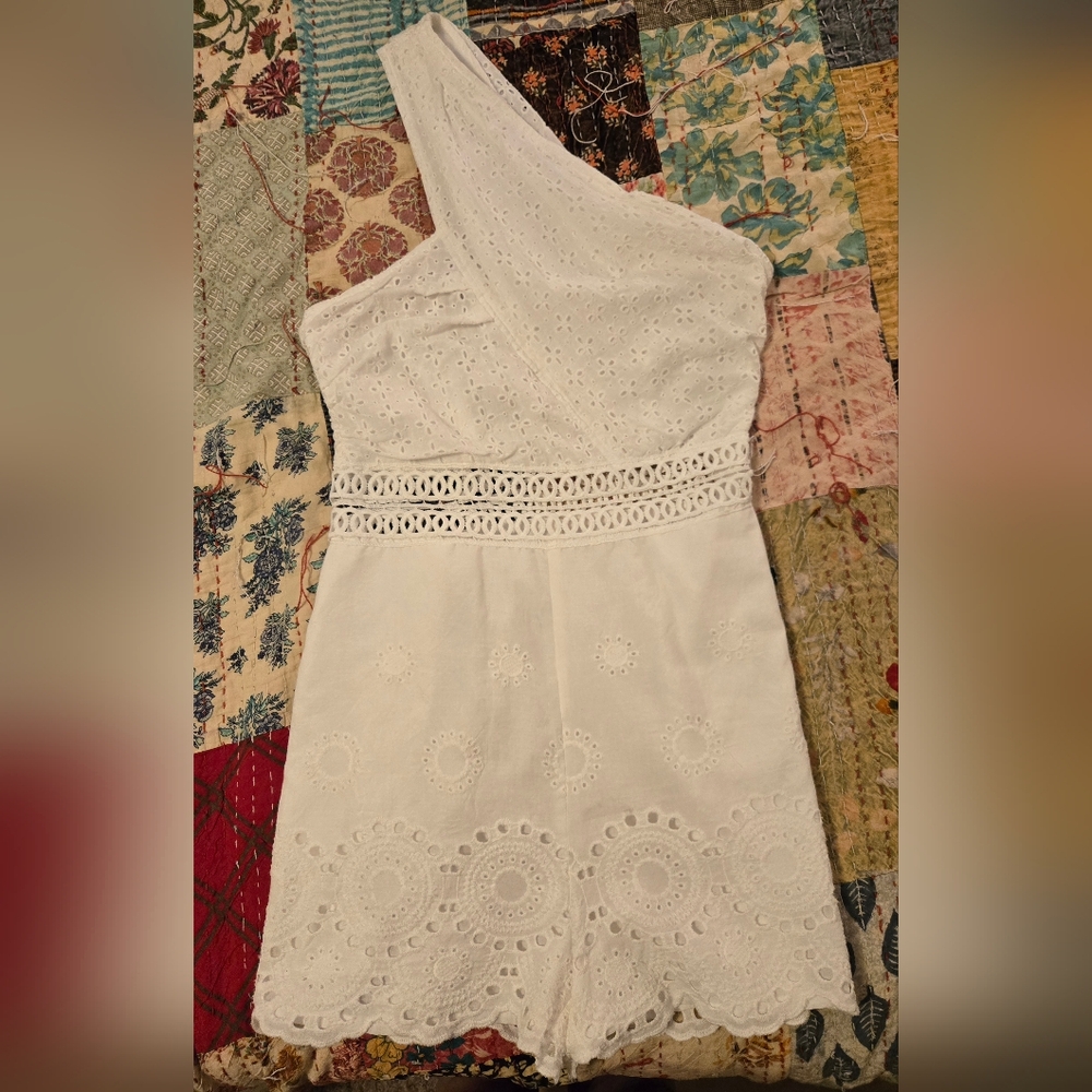110. Elegant White One-Shoulder Romper